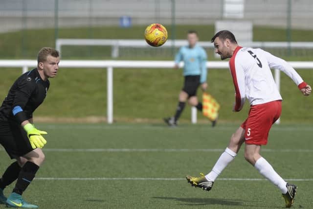 Blair Tolmie, seen scoring for Spartans last season, knows Linfield will provide tough opposition at Ainslie Park in the Irn-Bru Cup. Picture: Neil Hanna