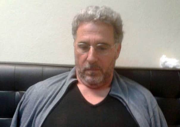 Italian authorities say a top 'ndrangheta crime syndicate boss, on the run since 1994, has been arrested in Uruguay where he had been living under a false name and with a forged Brazilian passport. Picture: Italian Police via AP