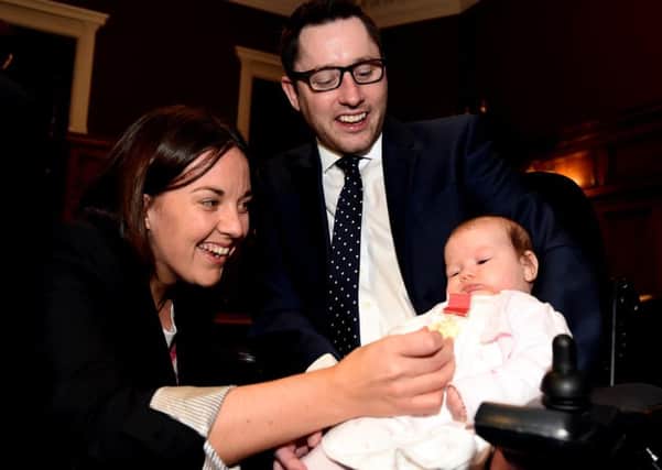 Kezia Dugdale with Gordon Aikman and his young niece. Picture: Lisa Ferguson