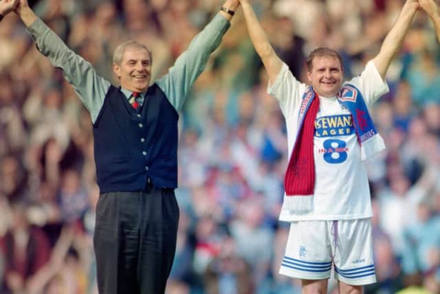 Walter Smith and Paul Gascoigne celebrate after Rangers had won their eighth title in a row. Picture: Ben Radford/Allsport/Getty Images