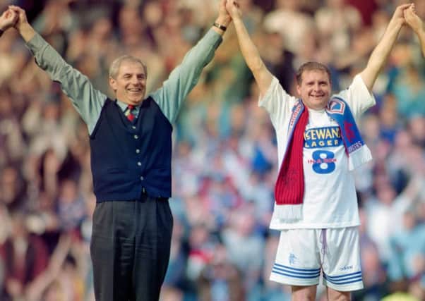 Walter Smith and Paul Gascoigne celebrate after Rangers had won their eighth title in a row. Picture: Ben Radford/Allsport/Getty Images