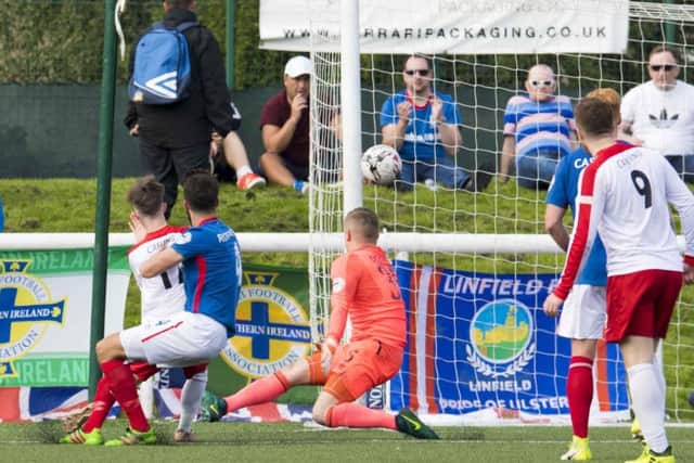 Spartans' Blair Atkinson pokes home to reduce the deficit. Picture: SNS/Craig Foy