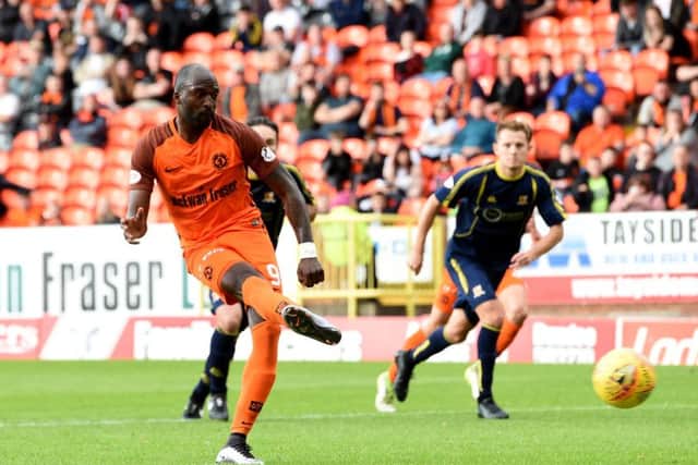 Dundee UTD's Patrick N'Koyi scores from the penalty spot. Picture: SNS/Paul Devlin