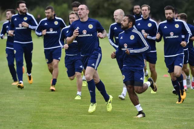 Scott Brown, centre, and the rest of the Scotland squad are put through their paces at Mar Hall. Picture: SNS.