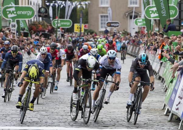 Caleb Ewan, far left, just gets to the line ahead of his rivals in Kelso to win the first stage of the Tour of Britain. Picture: PA.