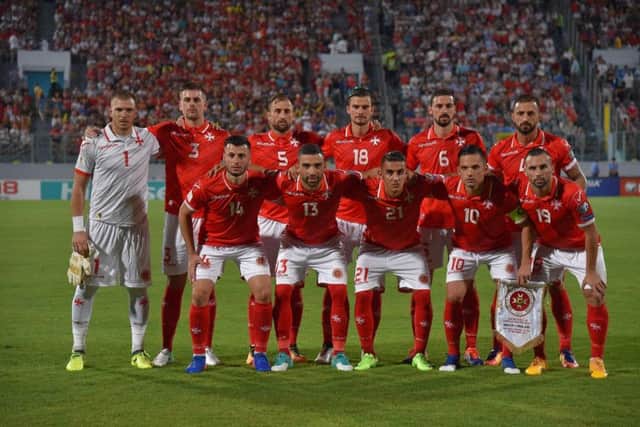 Malta's players pose before the 2018 FIFA World Cup group F qualifying football match against England. Picture: ANDREAS SOLARO/AFP/Getty Images