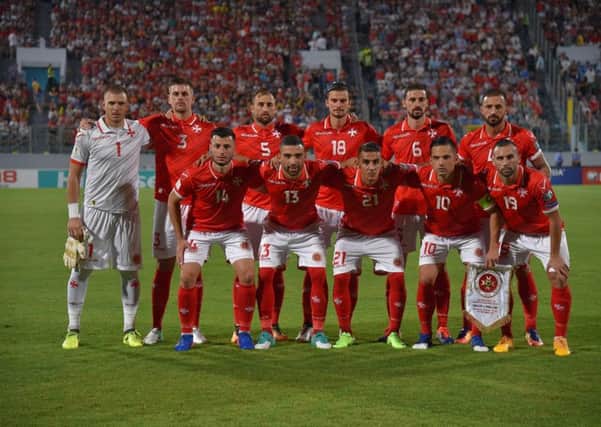 Malta's players pose before the 2018 FIFA World Cup group F qualifying football match against England. Picture: ANDREAS SOLARO/AFP/Getty Images