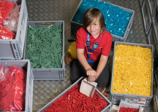 Stanley Bolland undertakes work experience as a 'Model Maker' at the Legoland Windsor Resort in Berkshire. Picture: David Parry/PA Wire