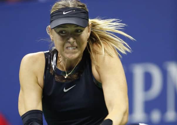 Maria Sharapova  feels the strain on her way to a 5-7, 6-4, 6-2  defeat  by Anastaija Sevastov. Picture: AP.