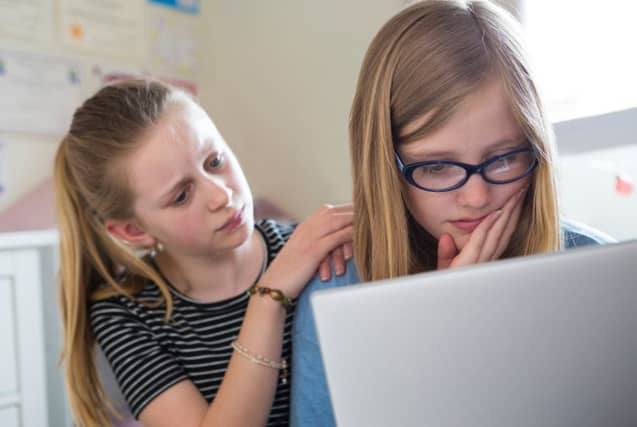 80 per cent of young people want social media firms to do more to prevent bullying. Picture: Getty Images