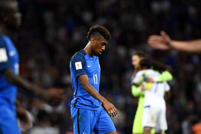 Dejected French forward Kingsley Coman leaves the field after his side had been held to a shock goalless draw by Luxembourg. Picture: AFP/Getty