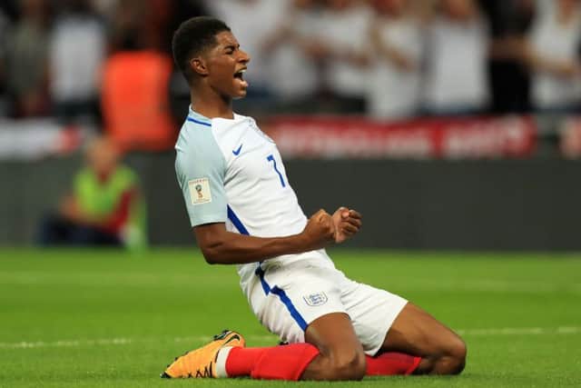 Marcus Rashford celebrates after scoring England's winner against Slovakia at Wembley.