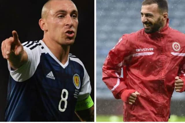 Scott Brown, left, accused Malta defender Steve Borg, right, of spitting at him. Pictures: SNS/Getty Images