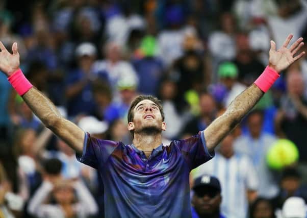 Juan Martin del Potro celebrates is fourth round win over Dominic Thiem of Austria. Picture: Clive Brunskill/Getty Images