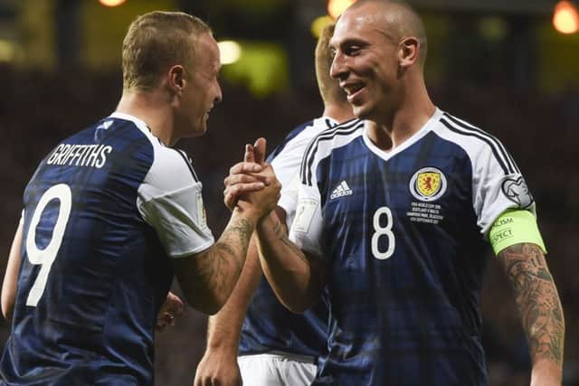 Scott Brown celebrates with Leigh Griffiths after Scotland's 2-0 victory over Malta.