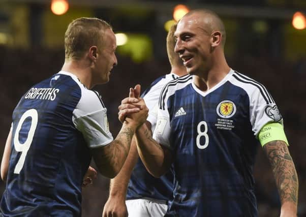 Scott Brown celebrates with  Leigh Griffiths after Scotland's 2-0 victory over Malta.