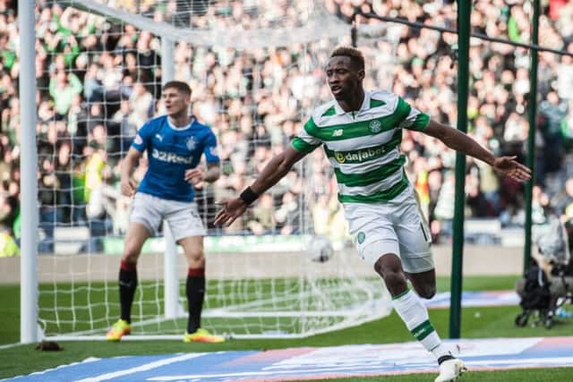 Moussa Dembele celebrates after scoring against Rangers in last season's League Cup semi-final. Picture: John Devlin