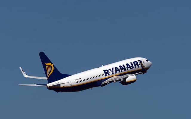 Ryanair will allow priority passengers to continue to bring two bags on board. Picture: Neil Hanna