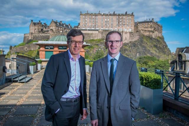 Deloitte partner John Macintosh, left, with Fraser of Allander director Graeme Roy. Picture: Chris Watt