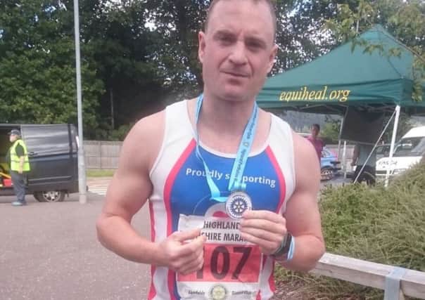 Corporal Jon Ward after completing his 80th marathon in Perth. Picture: Contributed