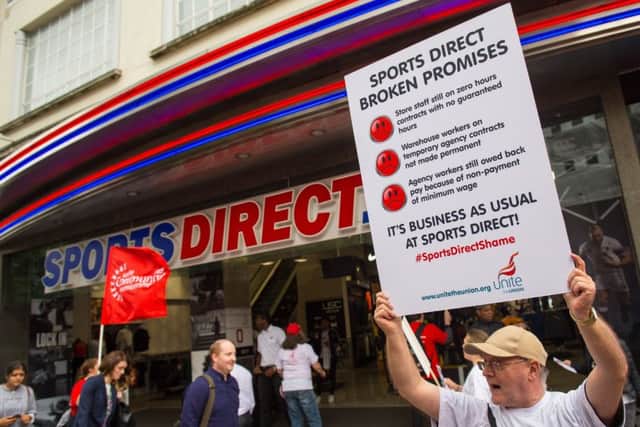 Unite protesters outside the Sports Direct flagship store on Oxford Street in London. Picture: Dominic Lipinski/PA Wire