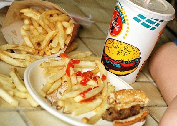 Fast food chains fuelling obesity crisis, report claims.
