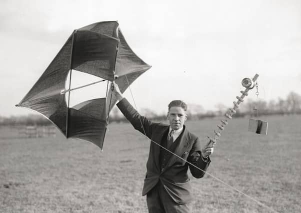 British physicist Robert Alexander Watson-Watt (1892 - 1973) experiments with a kite and a wireless transmitter at Sunnymeads in Berkshire. (Photo by Fox Photos/Getty Images)