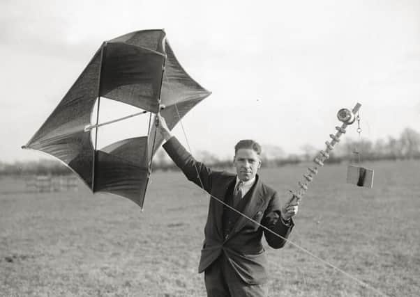 British physicist Robert Alexander Watson-Watt (1892 - 1973) experiments with a kite and a wireless transmitter at Sunnymeads in Berkshire.  (Photo by Fox Photos/Getty Images)