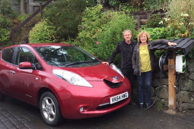 Ron and Tricia Neville have their own charging point in their drive.