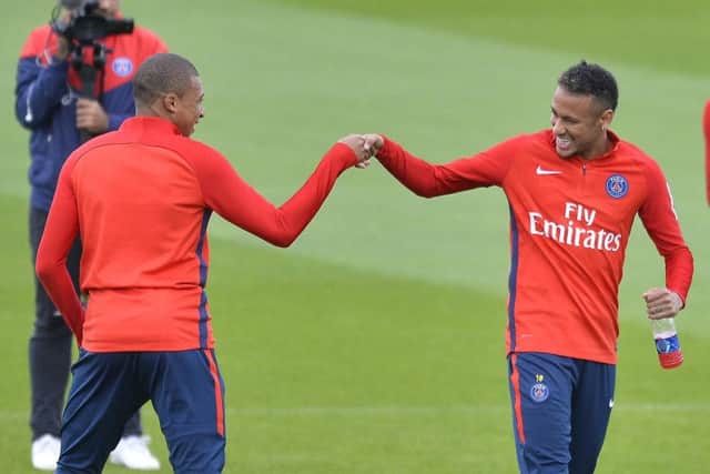 PSG strikers Kylian Mbappe (left) and Neymar Jr. The latter broke the transfer record this summer after moving from Barcelona. Picture: Getty