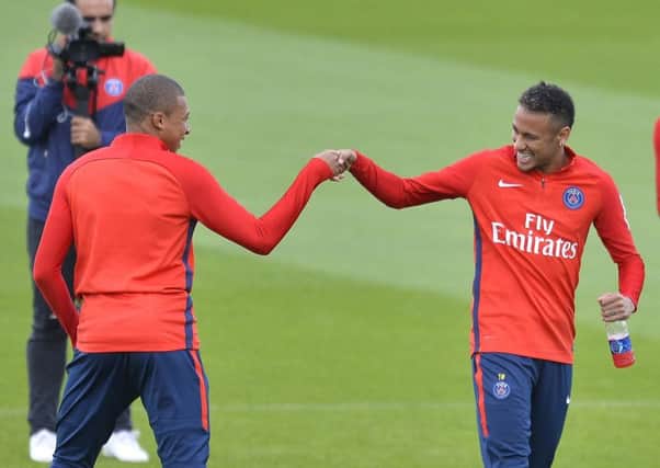 PSG strikers Kylian Mbappe (left) and Neymar Jr. The latter broke the transfer record this summer after moving from Barcelona. Picture: Getty