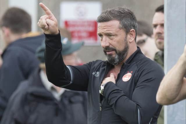 Derek McInnes will pit his wits against Craig Levein tomorrow. Picture: SNS.