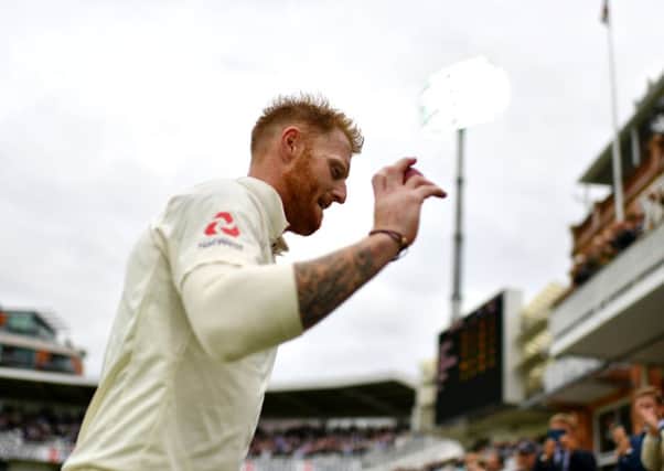 England's Ben Stokes acknowledges the Lord's crowd as he leaves the field after taking six wickets on the first day of the third Test. Picture: Getty Images