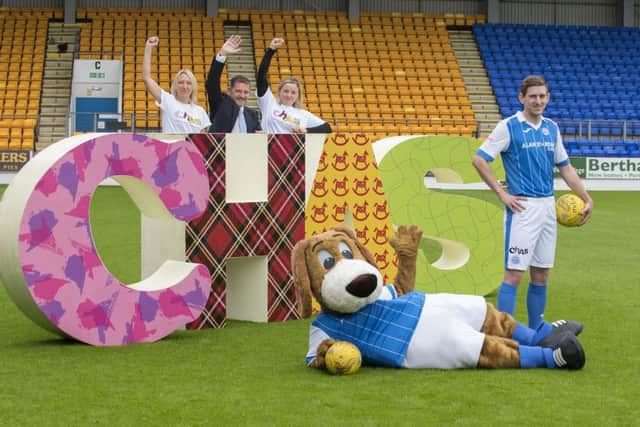Blair Alston St Johnstone FC footballer, Brogan the Beagle St Johnstone FC mascot, Criona Knight Corporate Fundraising Manager at CHAS, Steve Brown St Johnstone FC Chairman, Debbie Mooney Head of Campaigns at CHAS.  Picture: Angus Findlay/Contributed