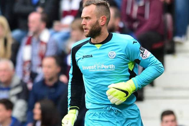 Alan Mannus is wary of the threat posed by Hibs but insists he just wants St Johnstone to survive. Picture: Getty Images