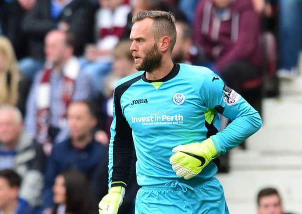 Alan Mannus is wary of the threat posed by Hibs but insists he just wants St Johnstone to survive. Picture: Getty Images