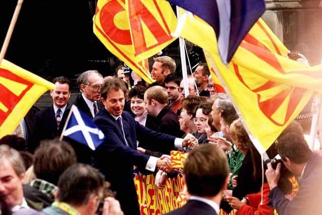 Tony Blair presses flesh in Edinburgh in 1997. Picture: Adam Butler/PA