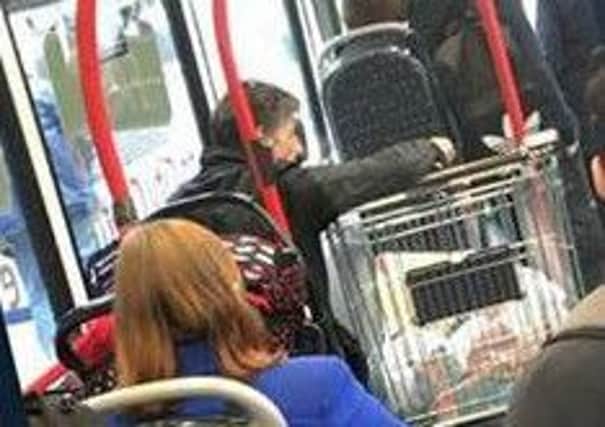 Dundee passenger brings trolley on to bus. Picture: Xplore Dundee