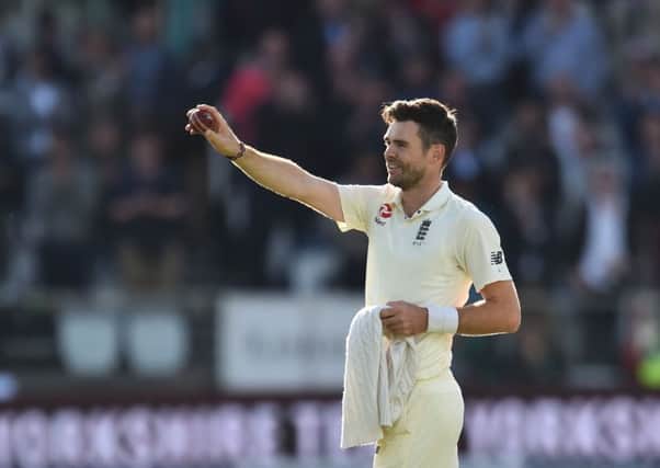 England's James Anderson holds the ball that took his 500th Test match wicket, West Indies' Kraigg Brathwaite for 4 runs. Picture: Glyn Kirk/AFP/Getty Images