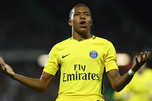 Kylian Mbappe of Paris Saint-Germain celebrates scoring on his debut. Picture: Dean Mouhtaropoulos/Getty Images
