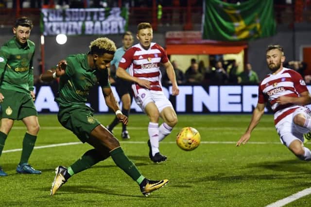 Scott Sinclair nets his side's third goal from an acute angle. Picture: SNS