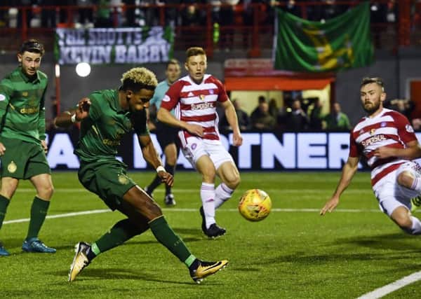 Scott Sinclair nets his side's third goal from an acute angle. Picture: SNS