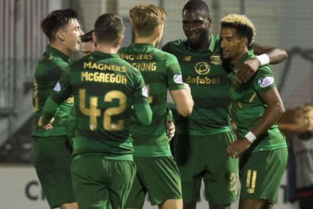 Celtic's Odsonne Edouard (second from right) celebrates his goal with his new team-mates. Picture: SNS