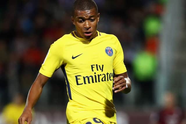 Kylian Mbappe of Paris Saint-Germain in action against Metz. Picture:  Dean Mouhtaropoulos/Getty Images