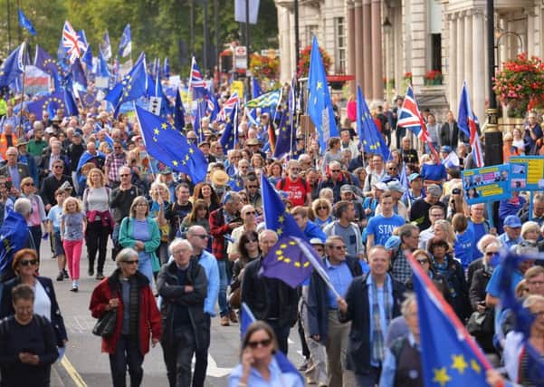 Protesters make their way along Piccadilly during of a pro-EU People's March For Europe in London yesterday. Picture: John Stillwell/PA