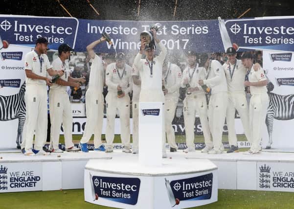 England captain Joe Root lifts the trophy after his sides 2-1 series win over West Indies.   Photograph: Kirsty Wigglesworth/AP