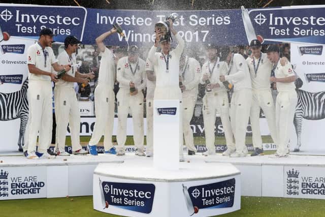 England captain Joe Root lifts the trophy after his sides 2-1 series win over West Indies.   Photograph: Kirsty Wigglesworth/AP