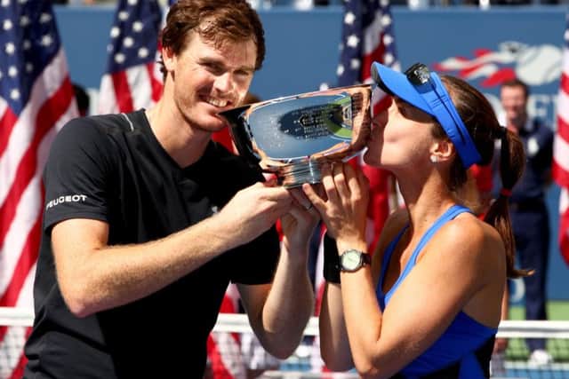 Jamie Murray of Great Britain and Martina Hingis of Switzerland pose during the trophy presentation after defeating Hao-Ching Chan of Taiwan and Michael Venus of New Zealand in their Mixed Doubles finals match. Picture: Clive Brunskill/Getty Images
