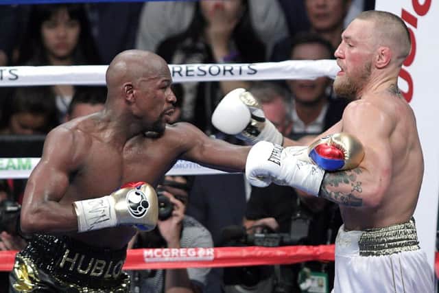 McGregor, right, took on Floyd Mayweather Jr. in Las Vegas last month. Picture: AFP/Getty Images
