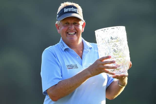 Colin Montgomerie poses with the trophy after winning the Japan Airlines Championship at Narita Golf Club. Picture: Getty Images